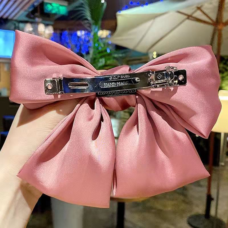 Korean version red bow hair clip, super large bow headpiece, internet-famous satin bow hair clip, spring clip, top clip Application Scenario