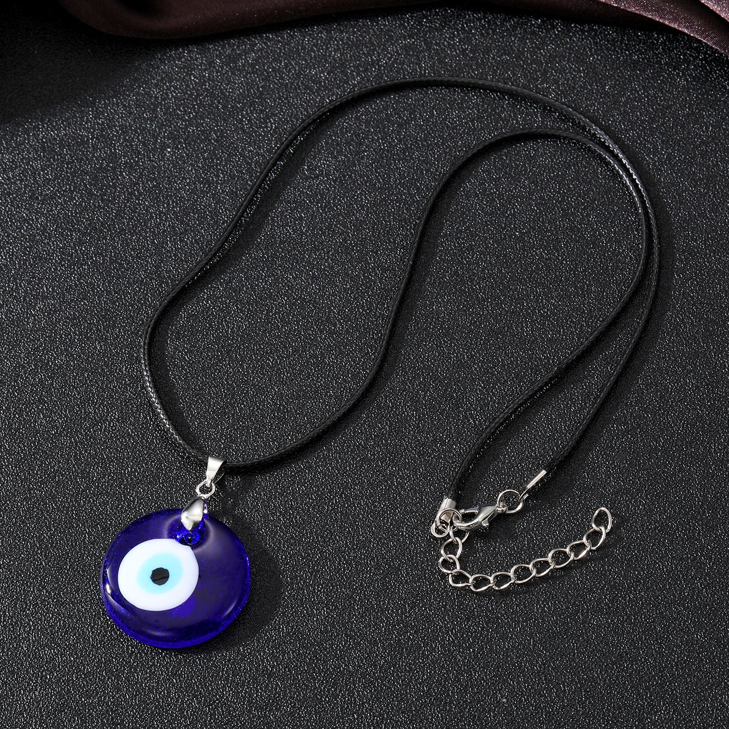 Retro blue glass pendant Devil's eye necklace, round Turkish blue eye sweater chain accessory for women Application Scenario