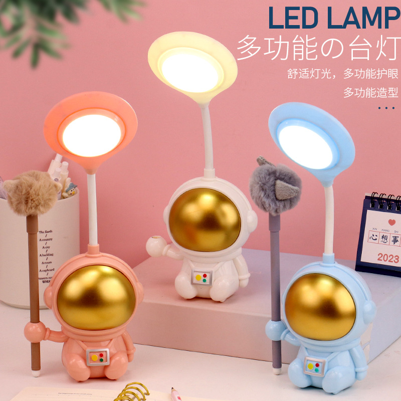 New cartoon sitting astronaut pen plug LED desk lamp, USB charging astronaut eye-protecting night light, children's gift