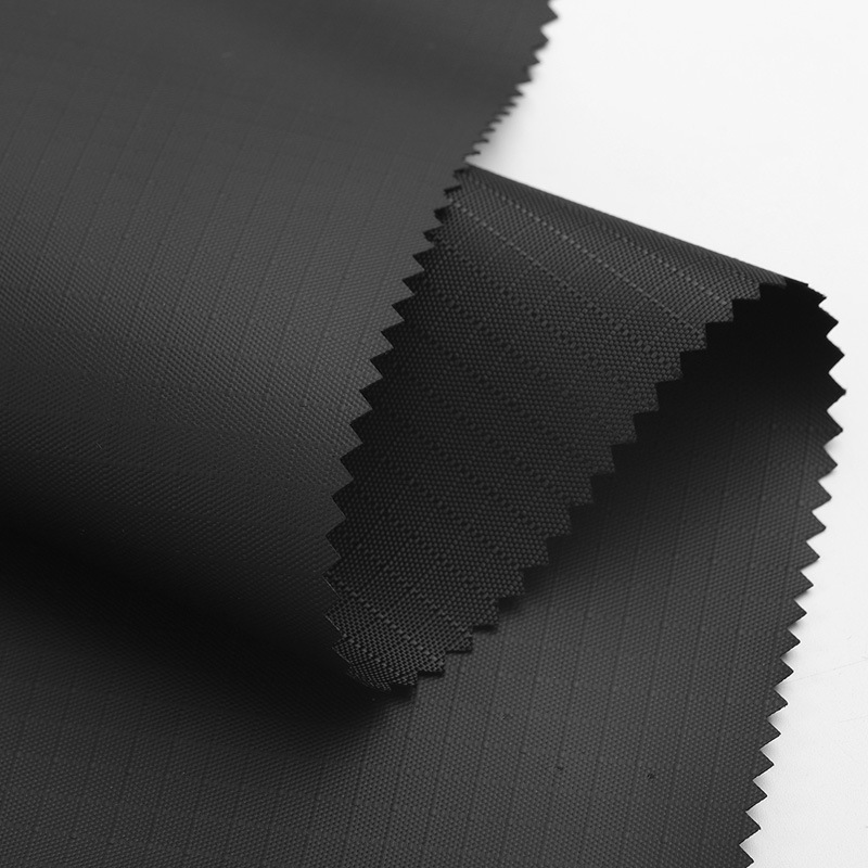 0.33 Thickness Leather Film Bag Fabric Factory Wholesale 420D Polyester 5 Points Leather Film Polyester Bag Fabric