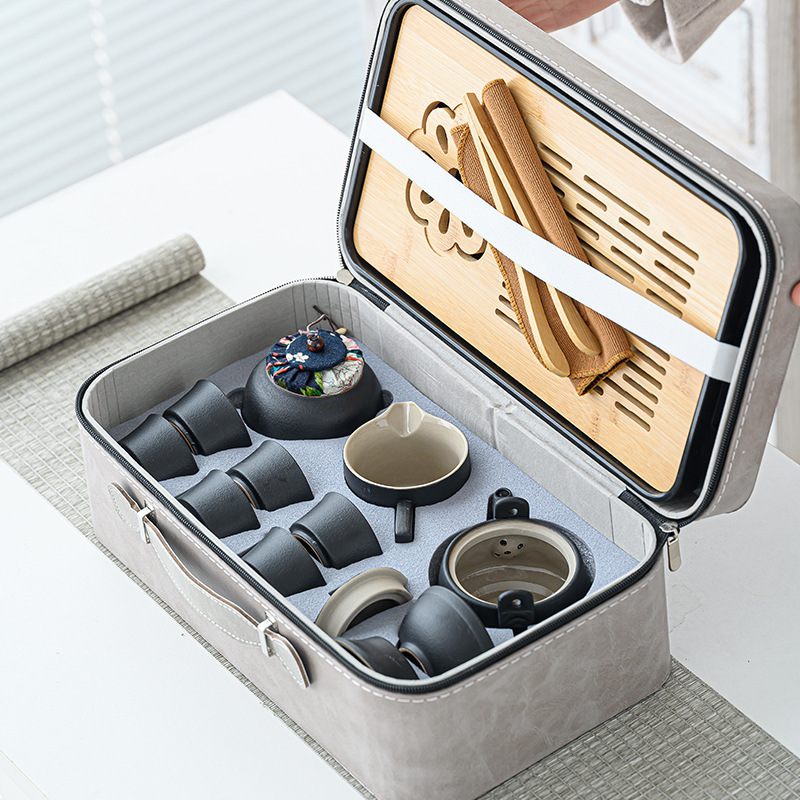 The Tea Charm Set is a simple and luxurious kung fu travel tea tray and tea ware. It is a portable and easy-to-use business activity gift Application Scenario