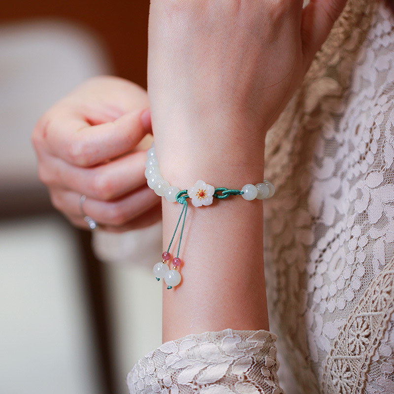 A natural Hetian jade bracelet with a garden full of spring colors, peach blossoms in full bloom, double-tassel woven rope jade Chinese-style bracelet details Picture