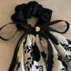 A new retro and high-end hair tie with a French elegant flower ribbon bow and a large colon hair band for women. A gentle headwear for women Specification image
