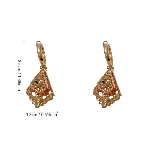 Melade a costa color zirconita cobre diamante pendientes mujeres luz lujo alto sentido atmosférico earloop diseño sentido hebillas auricular Application Scenario