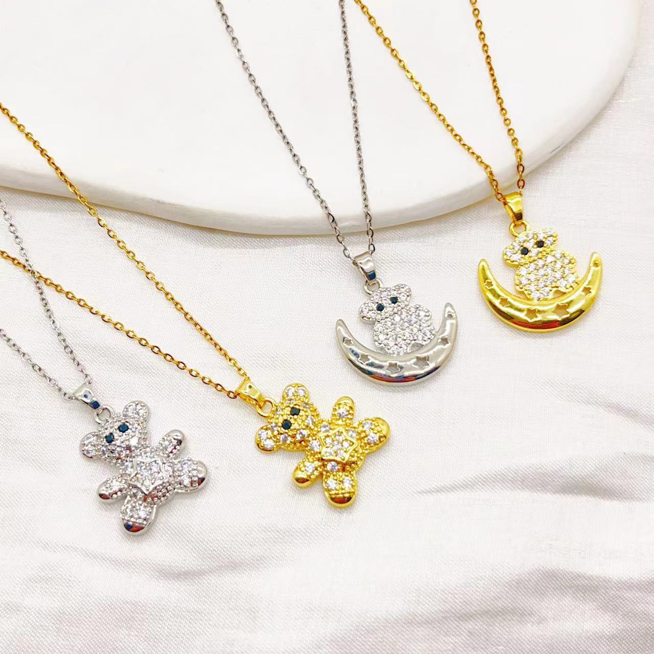 A popular cross-border bestseller from Europe and America: Moon, five-pointed star, slightly inlaid zircon, cute bear, elegant and personalized titanium steel necklace for women