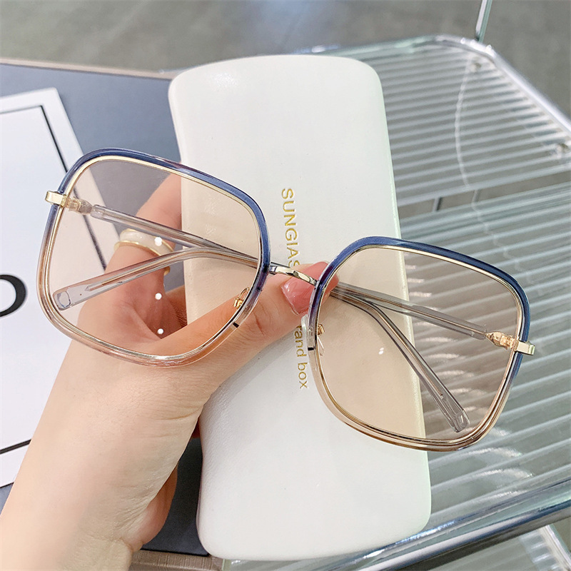 Nueva versión coreana de color creciente gafas de sol mujeres calle tiro caja de moda gran cara adelgace protección uv gafas vegan al por mayor