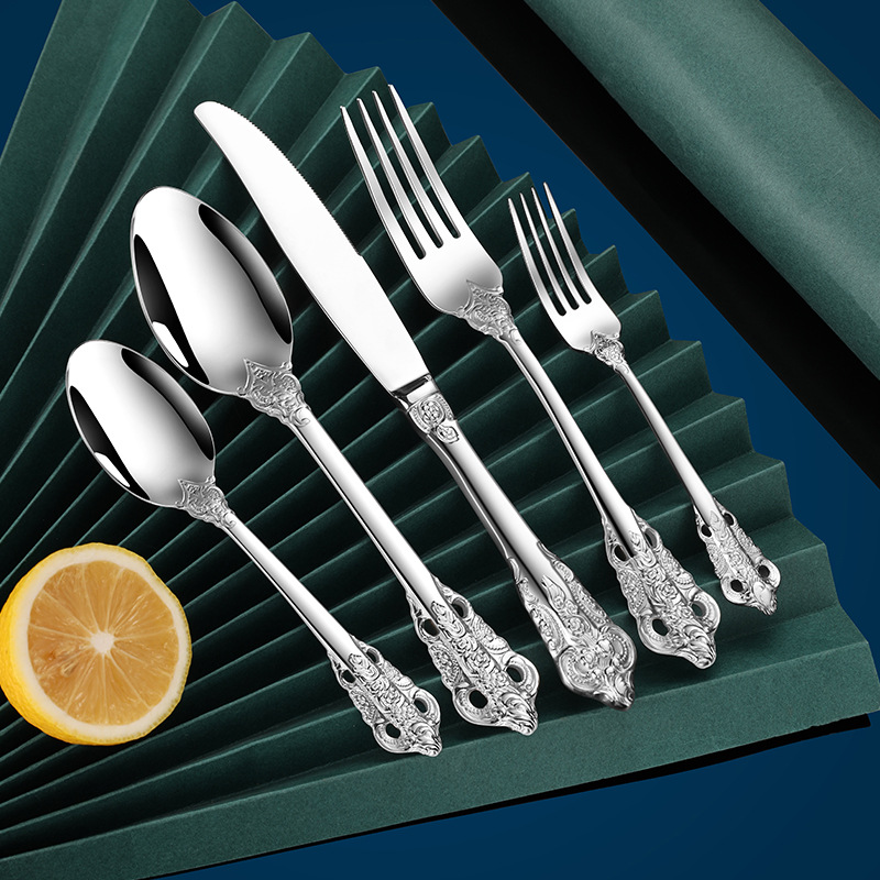 Retro carved handle stainless steel knife, fork and spoon set, light luxury and high appearance level hotel gift tableware set of four pieces details Picture