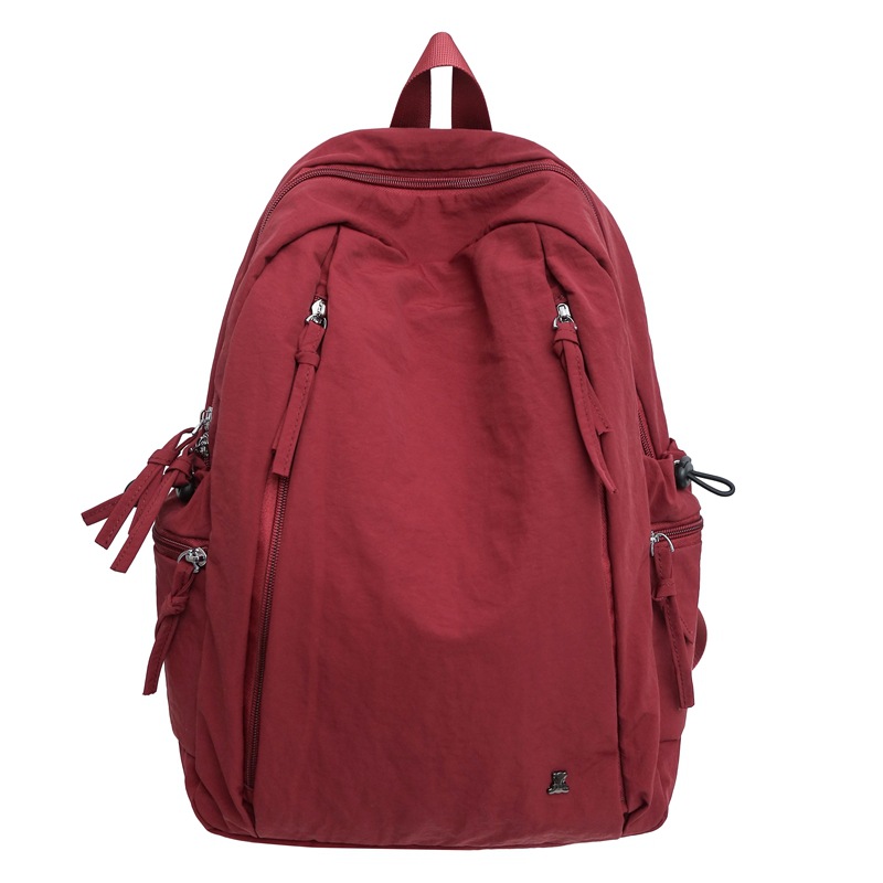 Female lightweight backpack for junior and senior high school students, Japanese-style casual schoolbag. Female college students, simple solid-color backpack. Female school style Item Picture