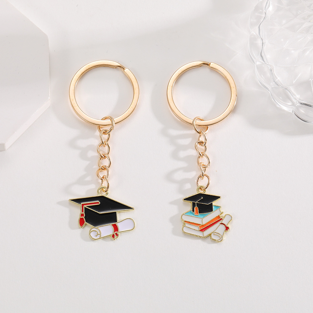 创意书本学士帽吊坠钥匙扣速卖通tume跨境毕业季纪念品包包配饰