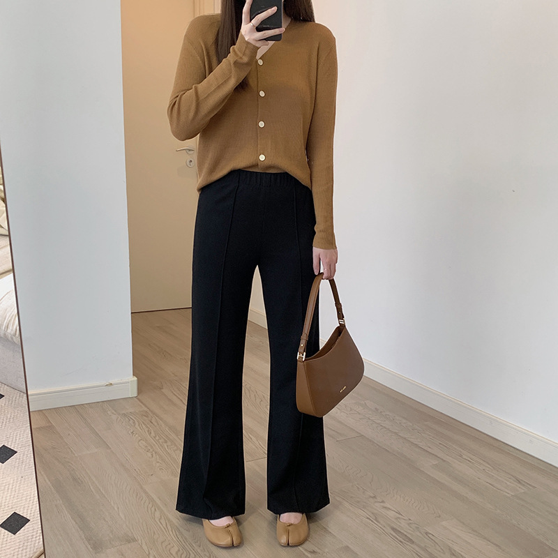 Black fishtail pants for women's early autumn commuting make them look slimmer. High-waisted slightly flared pants with a sense of drape and elegance. Slim and elastic long pants Application Scenario