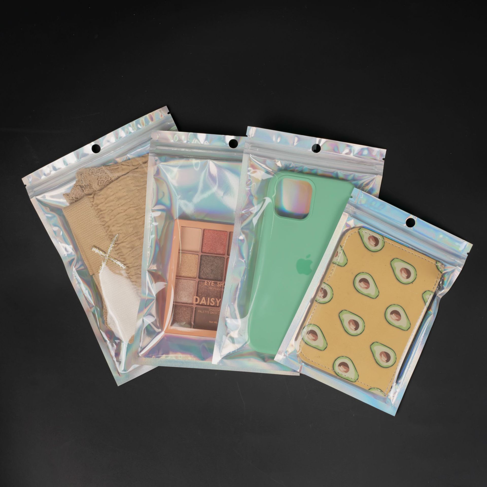 Wholesale of laser bags, yin-yang self-sealing bags, plastic transparent sealed bags for jewelry and cosmetics, data cable jewelry packaging bags details Picture