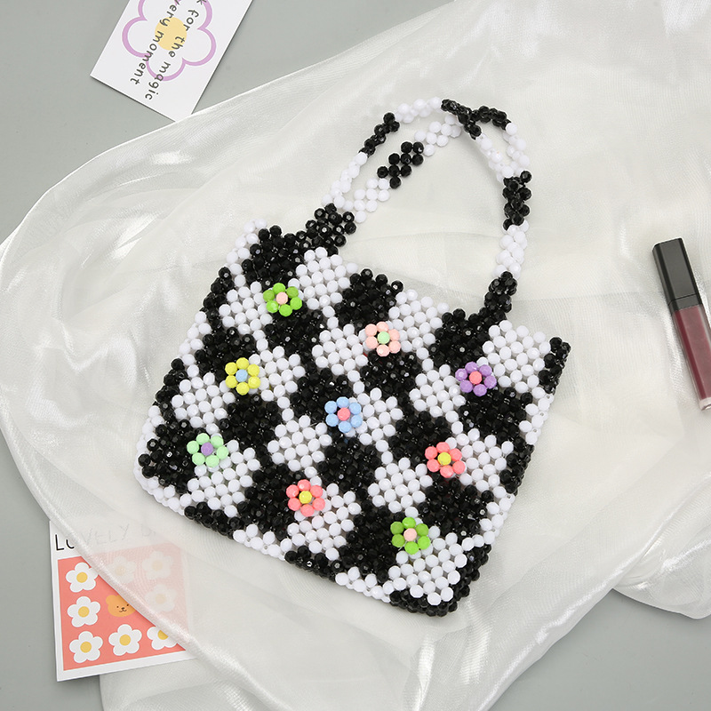 Creative color-blocking hand-held pearl bag, Japanese and Korean internet-famous hand-woven bag, pearl woven handbag, elegant decorative storage bag, and other hair accessories Specification image