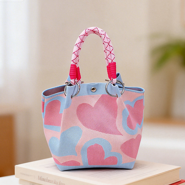 Factory direct sales cross-border new flower-knitted bucket bag as a souvenir gift bag, eco-friendly hand-held knitted bag for teachers, bucket bag for street vending, retail and wholesale, popular student small bag, fresh and artistic style, versatile crossbody bag for girls Application Scenario