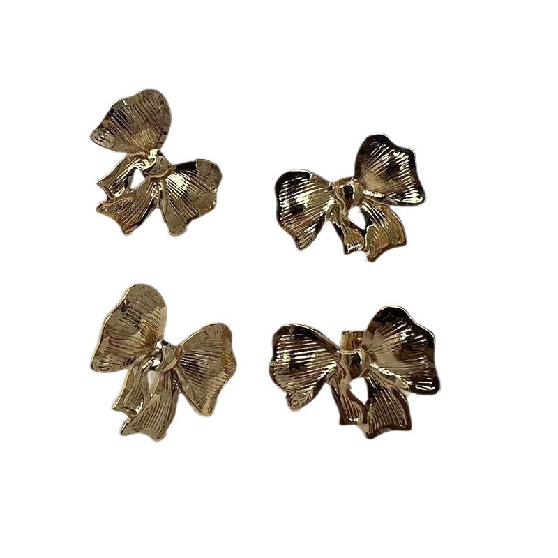 Sweet bow design copper earrings for women, European and American ins style, light luxury and fashionable, gold-plated stainless steel stud earrings Item Picture