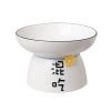 Ceramic cat and dog bowls, pet bowls, creative text, slanted mouth, high feet to protect the cervical vertebrae and prevent black chins, cat and dog food bowls Item Picture