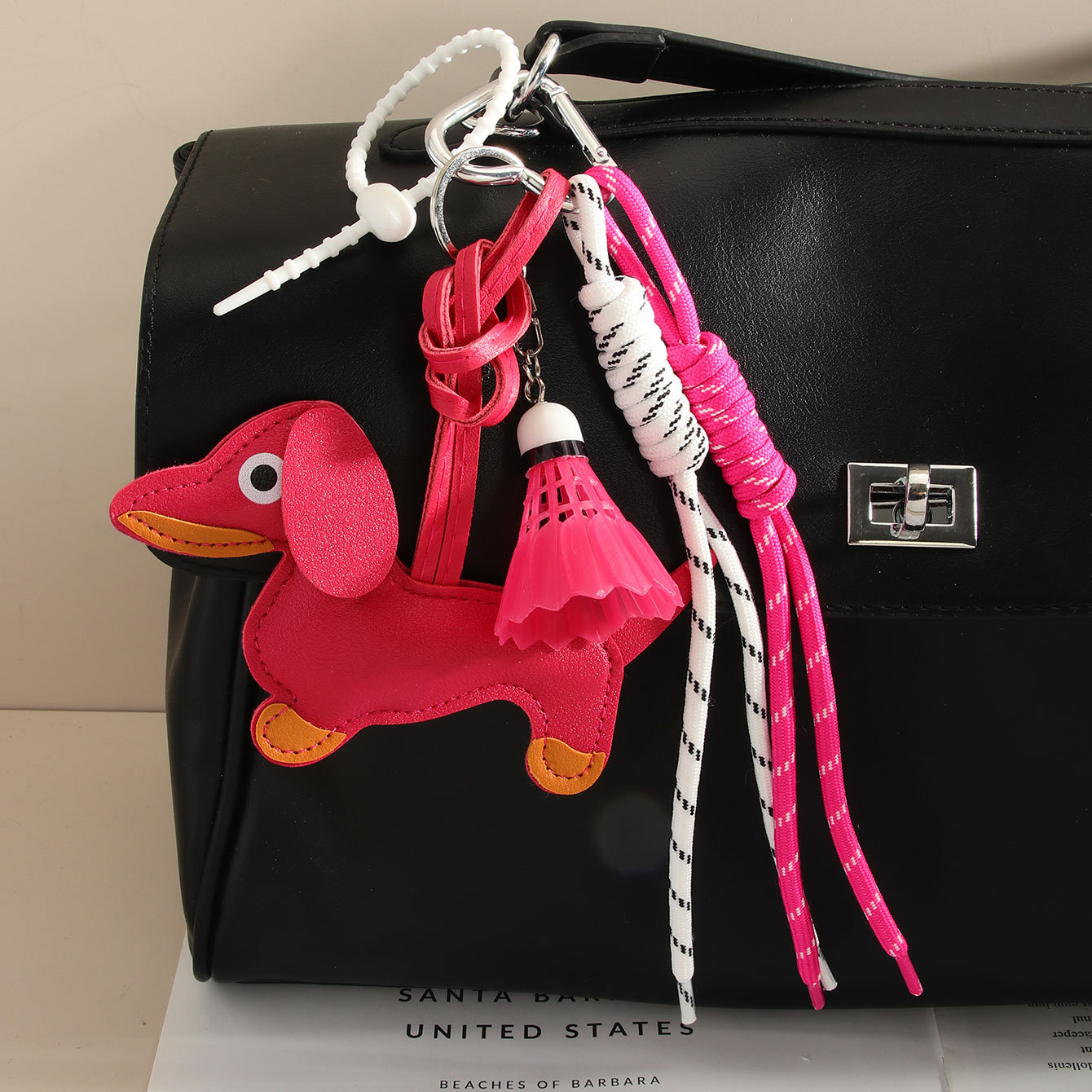 Ins-style cute leather dachshund puppy bag pendant, keychain, miu tie lanyard, badminton woven rope pendant