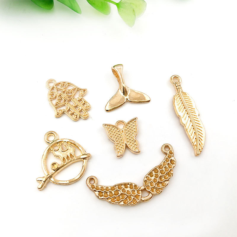 Mixed 100 Kc Gold Alloy Pendant Accessories Pendant Accessories Bracelet Necklace Handmade Diy Jewelry Accessories Material Bag Application Scenario