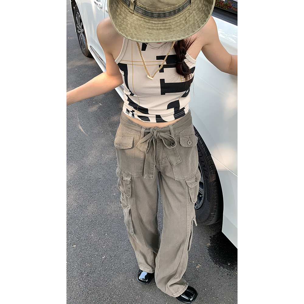 Denim is very busy. New trendy workwear pants with a stylish lace-up design for women