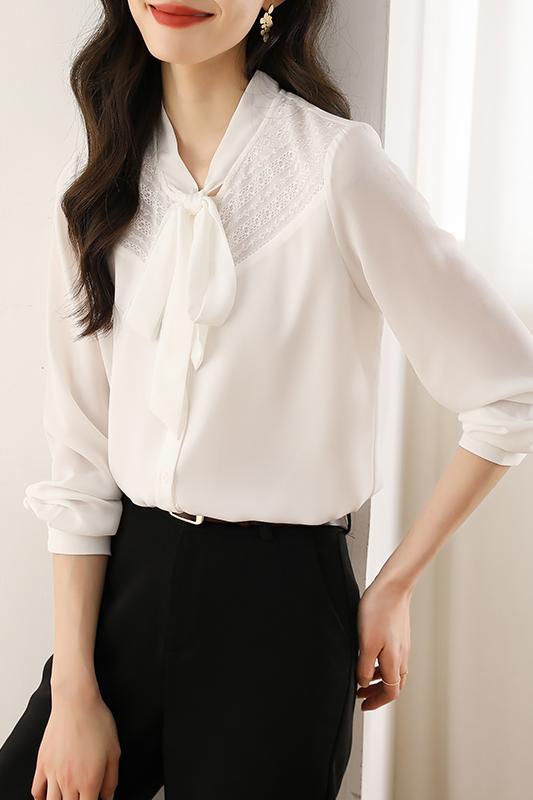 This is a new 2023 autumn collection of women's shirts with a unique design sense and a flowing collar. It features a lace and patchwork blouse for women Item Picture
