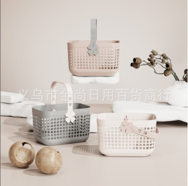 Hand-held hollowed-out washbasin storage basket, four-leaf clover handle basket wholesale, plastic bath basket, bath basket, handle basket full figure