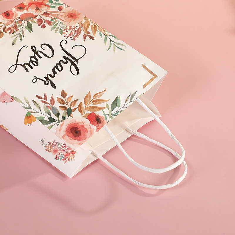 In-stock kraft paper bags, cartoon rose, clover, sunflower packaging, universal bags, paper bags for giving gifts, gift bags Specification image