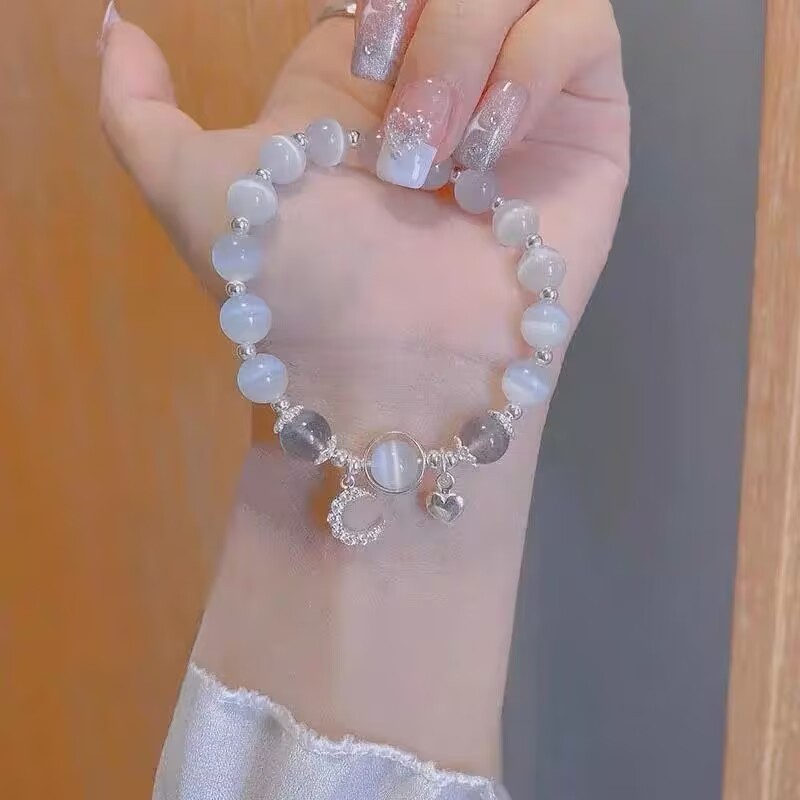 ins Grey Moonlight anti-cat's eye bracelet for Women, simple bell pendant, birthday gift for best friend, Douyin style details Picture
