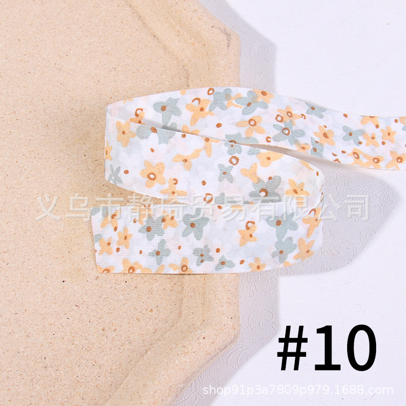 Korean version double-sided small flower printed pattern ribbon diy bow children's hair accessory material cake flower packaging tape Specification image