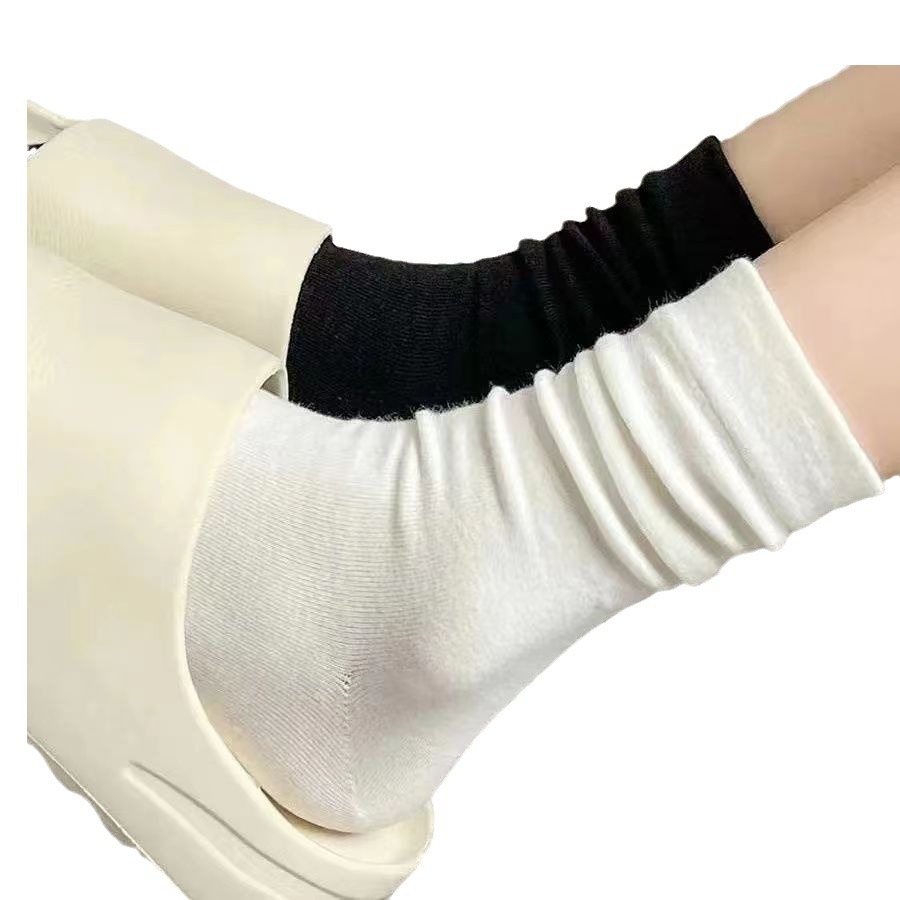 Women's postpartum socks, autumn and winter socks, women's socks, solid-colored long socks, pile socks, warm long socks wholesale Item Picture