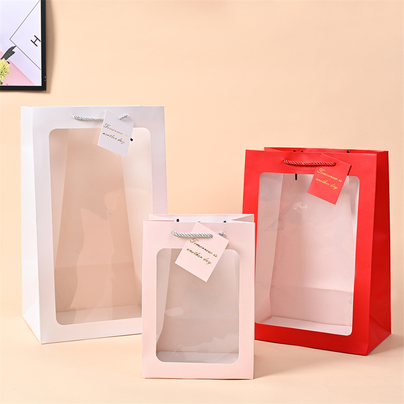 Transparent windowed handbag, Teachers' Day flower packaging gift bag, souvenir gift box packaging paper bag, doll gift bag Specification image
