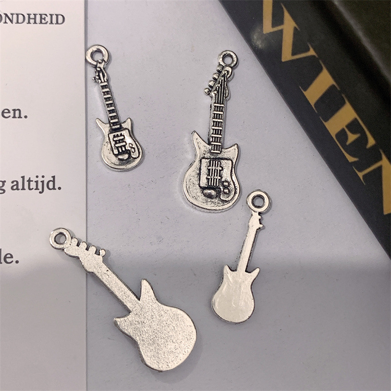 DIY zinc alloy jewelry accessories, retro guitar accessories, sweater chains, keychains, pendants, handcrafted jewelry pendants Specification image