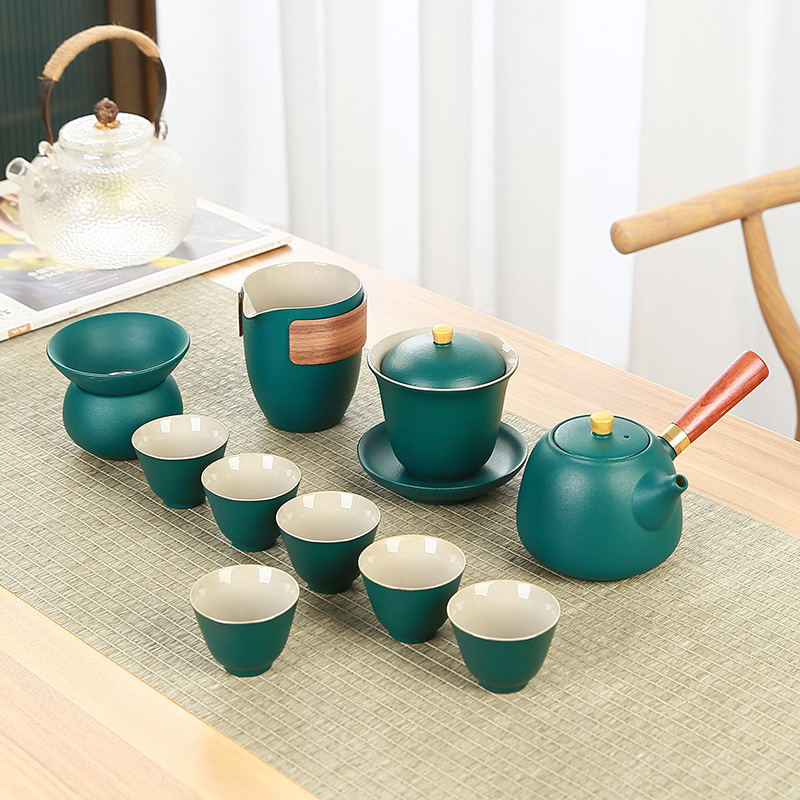 A complete set of Japanese coarse earthenware Lu Bao Kung Fu tea sets, black earthenware tea cups, covered bowls, side-handled teapots, and creative logos for both home and commercial use details Picture