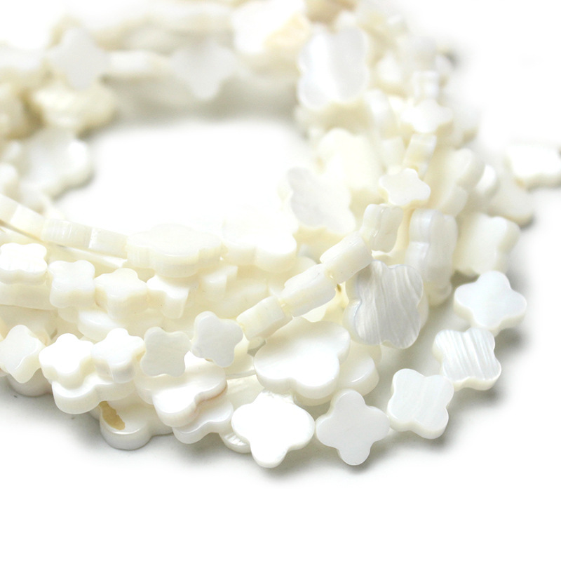 Freshwater white shell four-leaf clover-shaped DIY jewelry accessories, hair ornaments, beaded bracelets, necklaces, earrings, and loose beads Item Picture