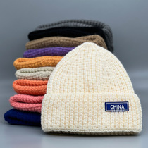 Knitted hat men's and women's autumn and winter warm ear protection woolen hat wrenching cute baotou cap CHINA cloth label age reduction