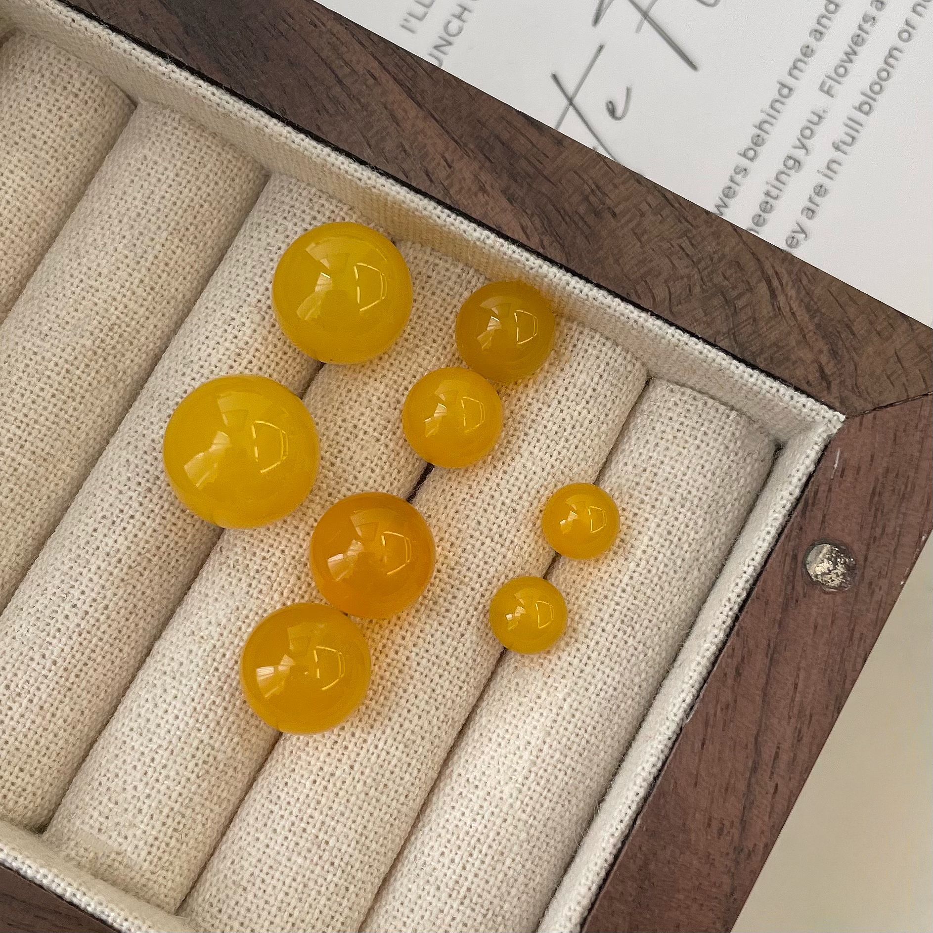 S925 plata esterlina amarillo ágata pendientes de oído simple y versátil ins temperamento de alta clase estilo de diseño de nicho Application Scenario