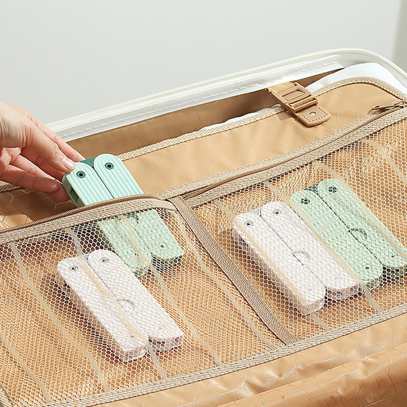 Folding hanger travel thickened portable hanger socks underwear drying rack telescopic hanger storage device Application Scenario