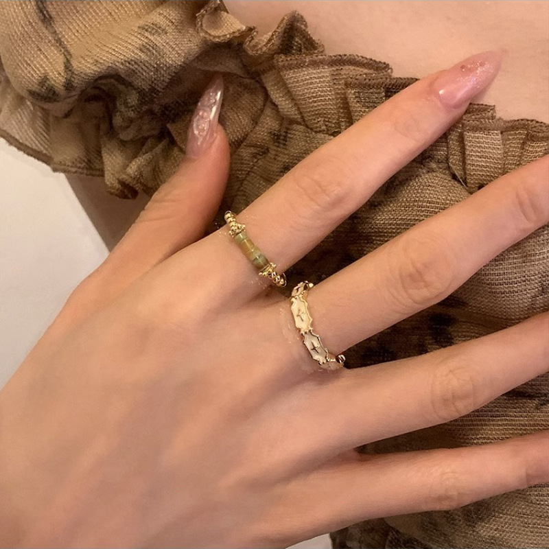 A niche new Chinese-style jade ring for women, with a light luxury style, is fashionable and versatile, and has a high-end feel. It is an adjustable index finger ring with a traditional Chinese style details Picture
