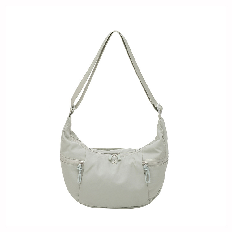 大学生书包女/包包女斜跨百搭/女式挎包/帆布包/箱包白底实物图