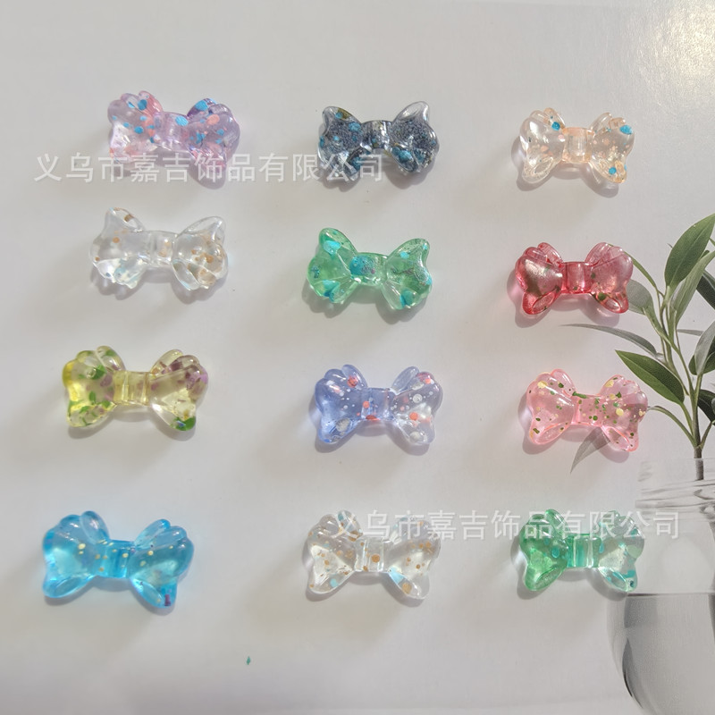 DIY jewelry accessories, nail patches, small bows, transparent color-coated oil paintings, acrylic mobile phone chains, beaded materials details Picture