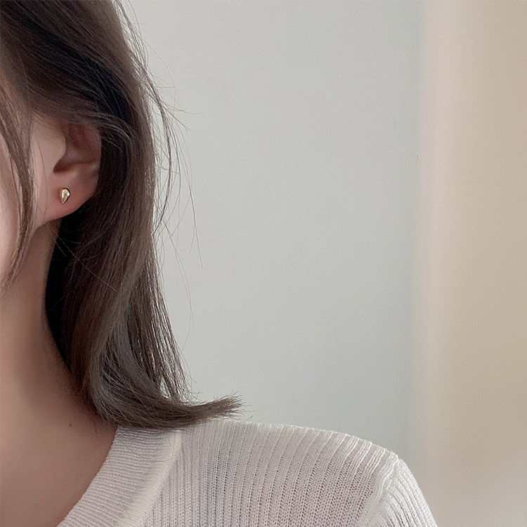 A Pair Of Women Wearing Water Drop Metal Earrings South Korea Simple Everything Temperament Personality Fashion Studs Earrings Cold Wind Item Picture