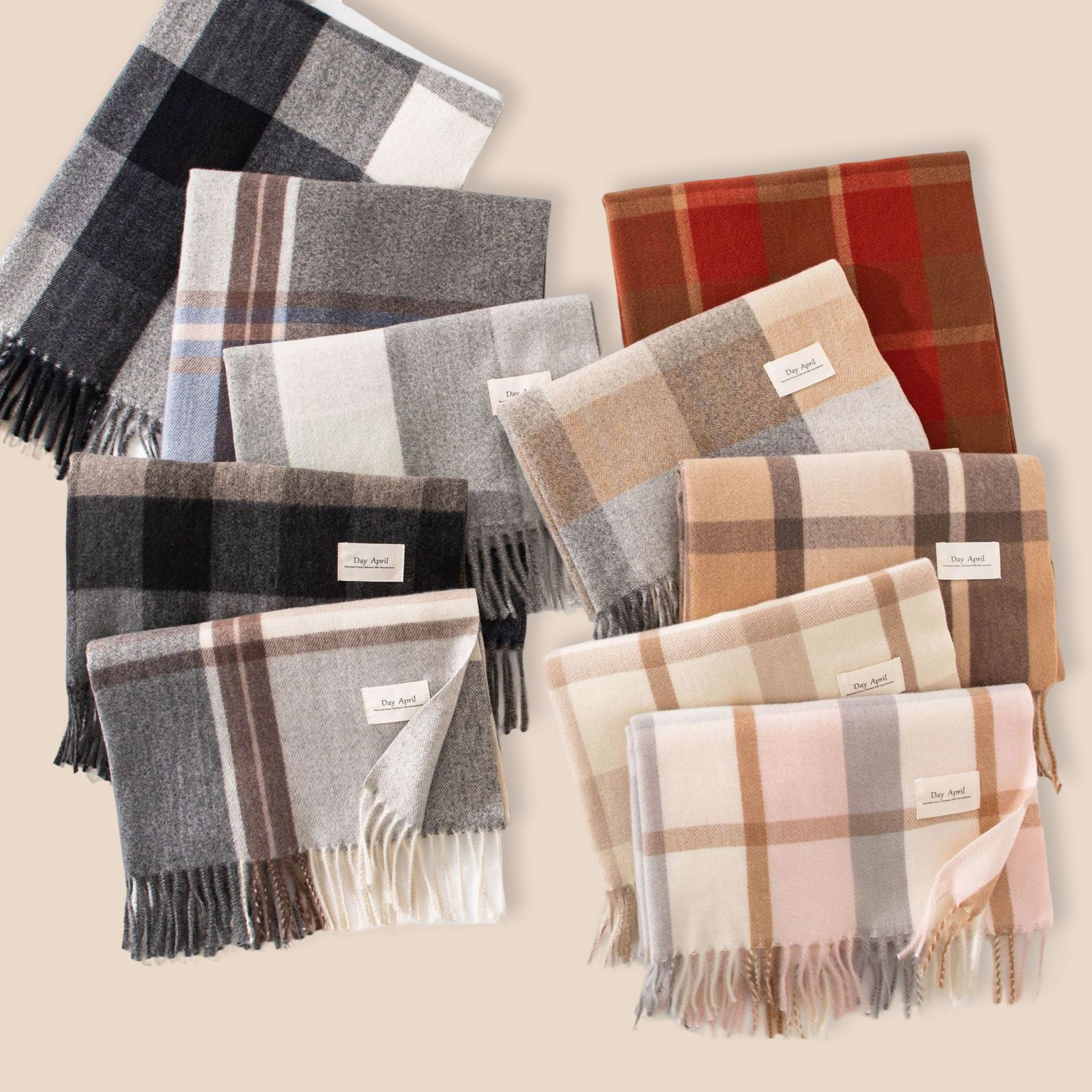 The women's winter scarf exudes a sense of sophistication. The autumn grey checkered faux cashmere scarf has a fashionable and warm design. The scarf is a shawl for men