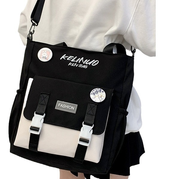 书包学生2023时尚/玉桂狗双肩背包/玉桂狗包/卡皮巴拉/商务书包白底实物图
