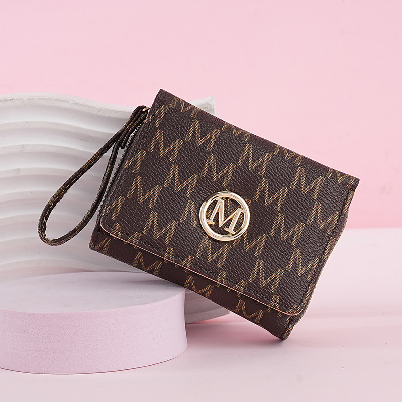 This is a new cross-border short women's wallet with a 30% discount zipper coin purse. It is simple and fashionable with an old pattern card bag