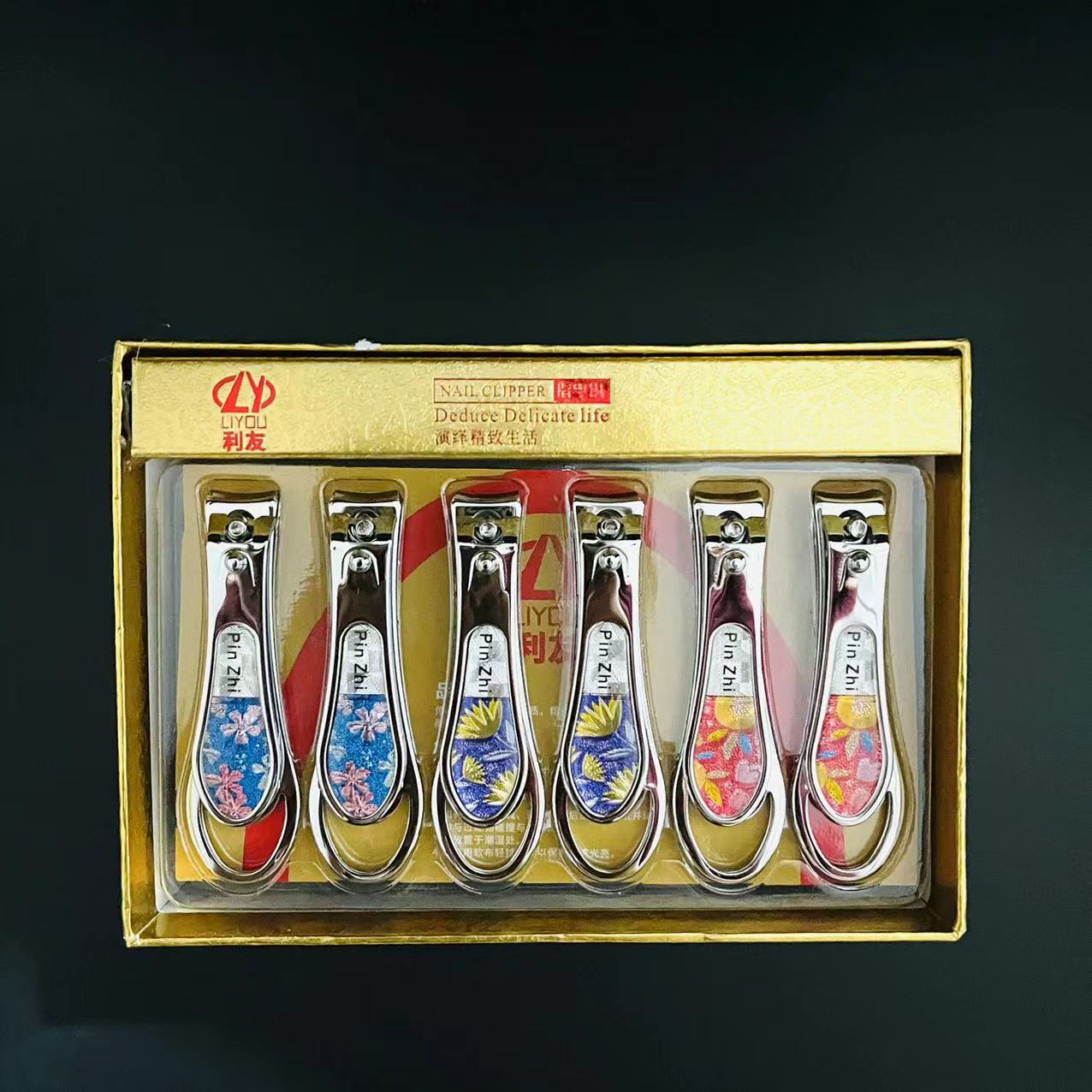 【 Office 】K329-9 nail clippers 24/ box 240/ Medium box 1K329-9 nail clippers, new patterned nail clippers, household portable nail clippers 2 yuan store wholesale supply Specification image