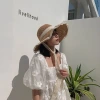 A Korean-style, trendy Japanese-style summer hat with breathable lace trim and a fresh, windproof rope crochet Application Scenario