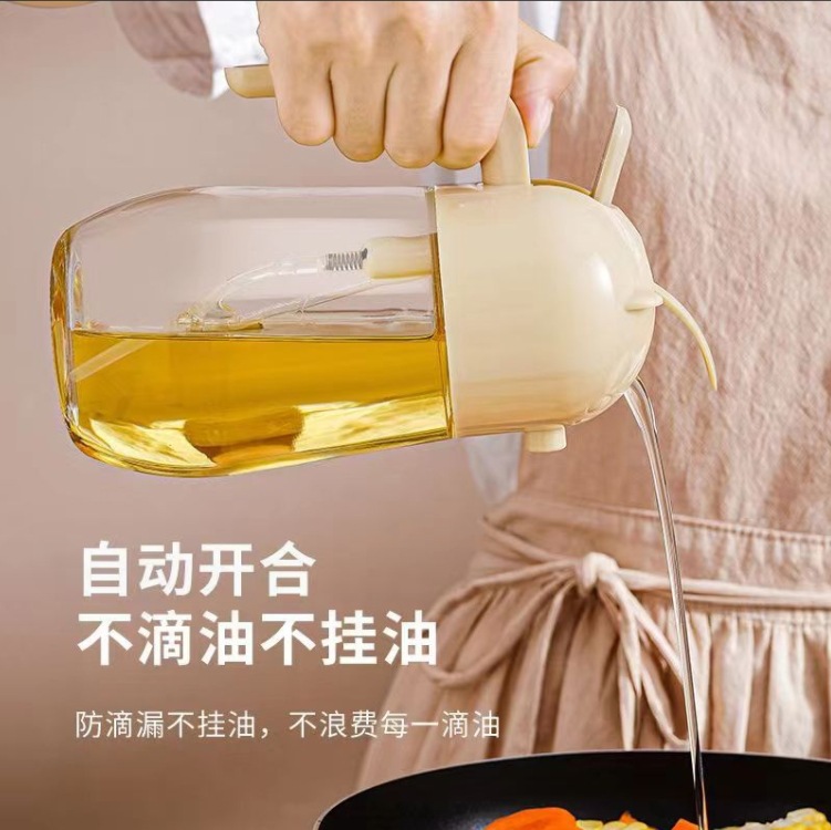 Wholesale of dual-purpose oil spray bottle for kitchen, automatic opening and closing oil pouring pot by pressing the oil spray bottle, glass oil tank details Picture