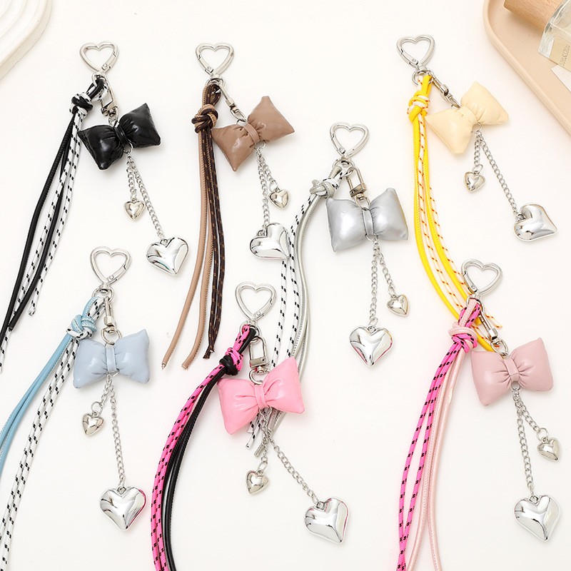 Bow heart-shaped pendant, ins new leather bag keychain pendant accessory, single button tassel pendant accessory details Picture