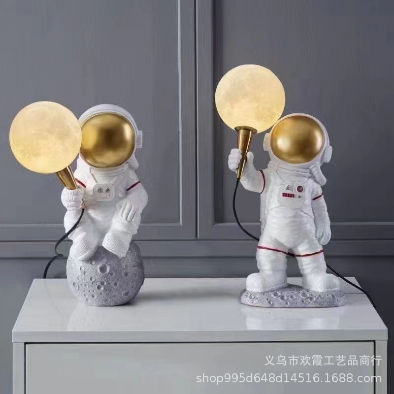 Astronaut children's room table lamp, bedroom bedside desk, creative night light, moon decoration, popular astronaut wall lamp details Picture