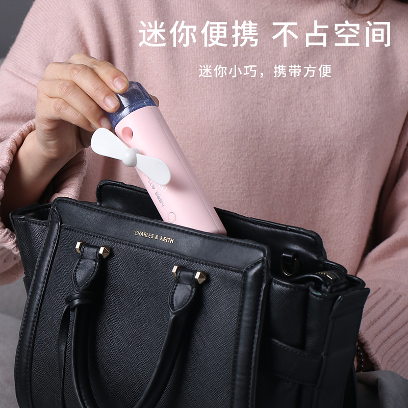 New handheld automatic spray fan, usb mini beauty humidifier, water replenishment device, strong wind force, student dormitory Application Scenario