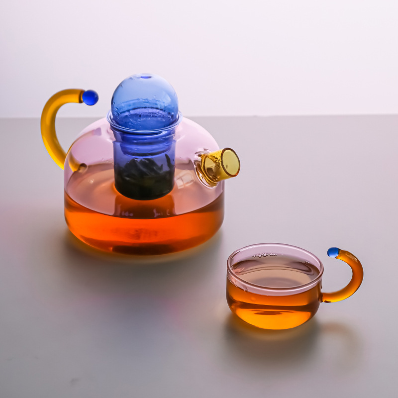 Creative high-temperature resistant glass tea water separation and filtration small brewing teapot, household electric ceramic stove, tea flower brewing teapot around the stove Application Scenario