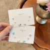 Cat-shaped taiyaki ear stud, a niche design for women, is small, funny and cute. It features cartoon cat claws and little fish ear stud earrings details Picture